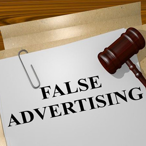 False advertising - a legal term. Image shows a gavel and scales of justice, symbolizing the legal consequences of deceptive marketing practices- Moss Bollinger LLP