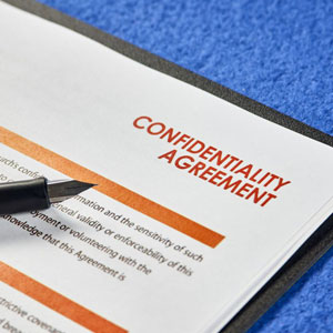 Confidentiality agreement on blue background: a legal document ensuring privacy and non-disclosure - Moss Bollinger LLP